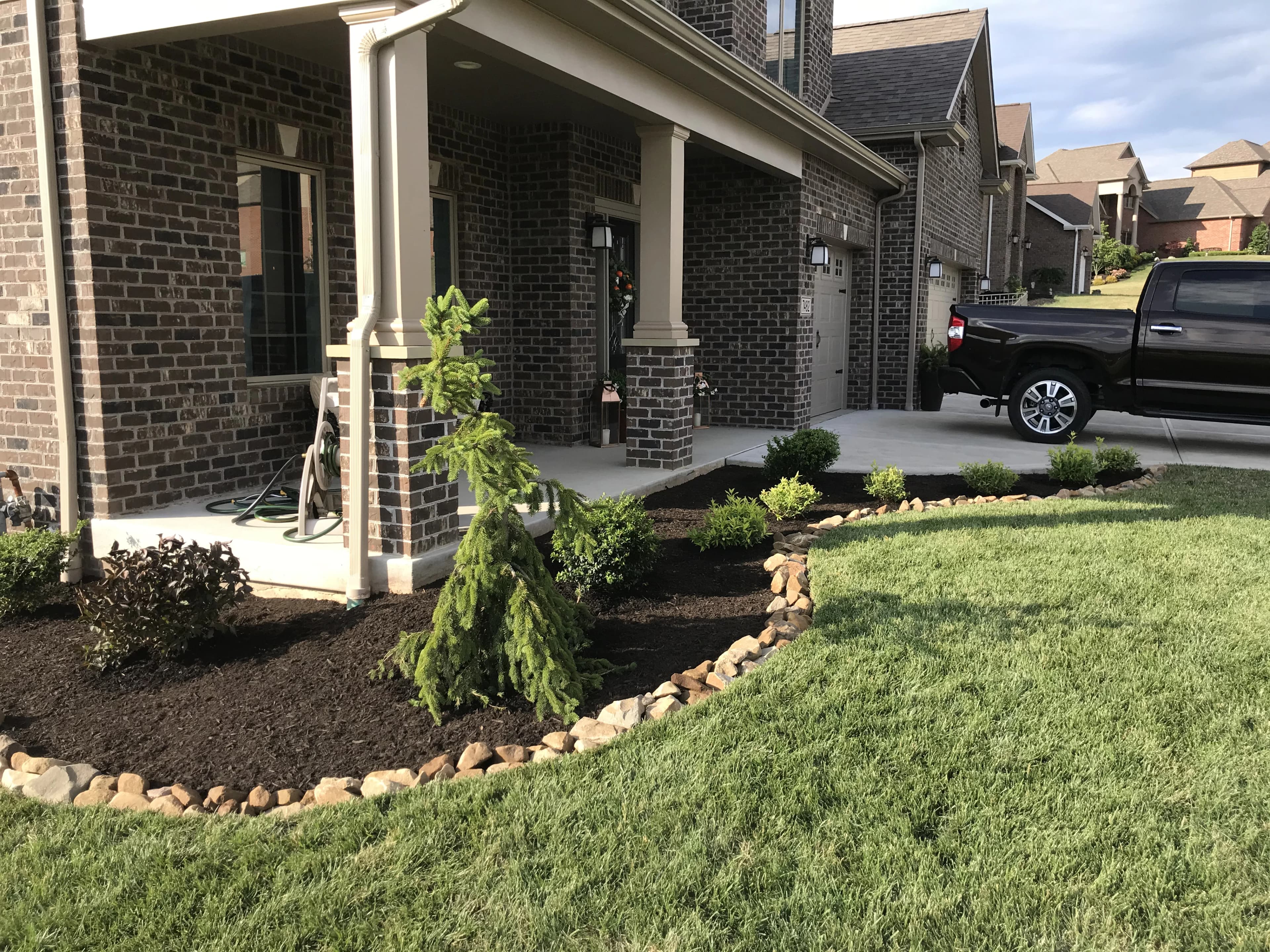Professionally mulched landscape beds at residential property